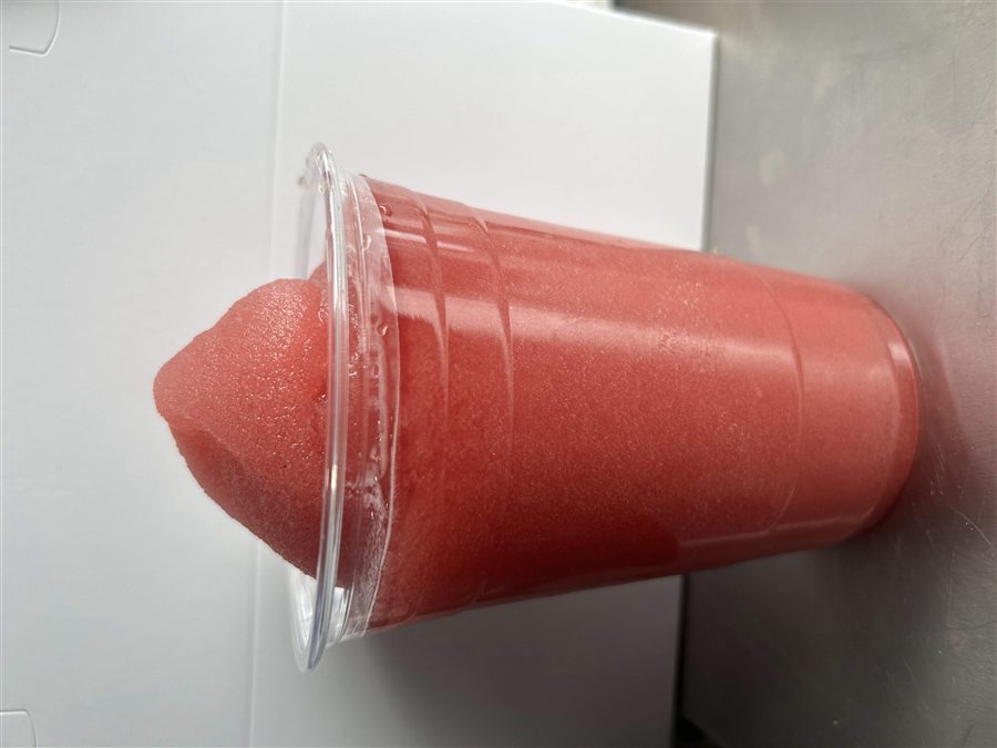 Large frozen limeade in a clear cup